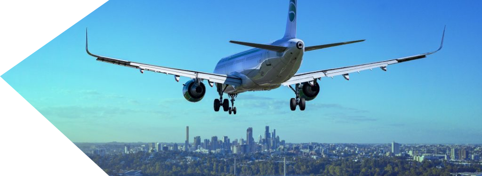 Plane flying away over a city